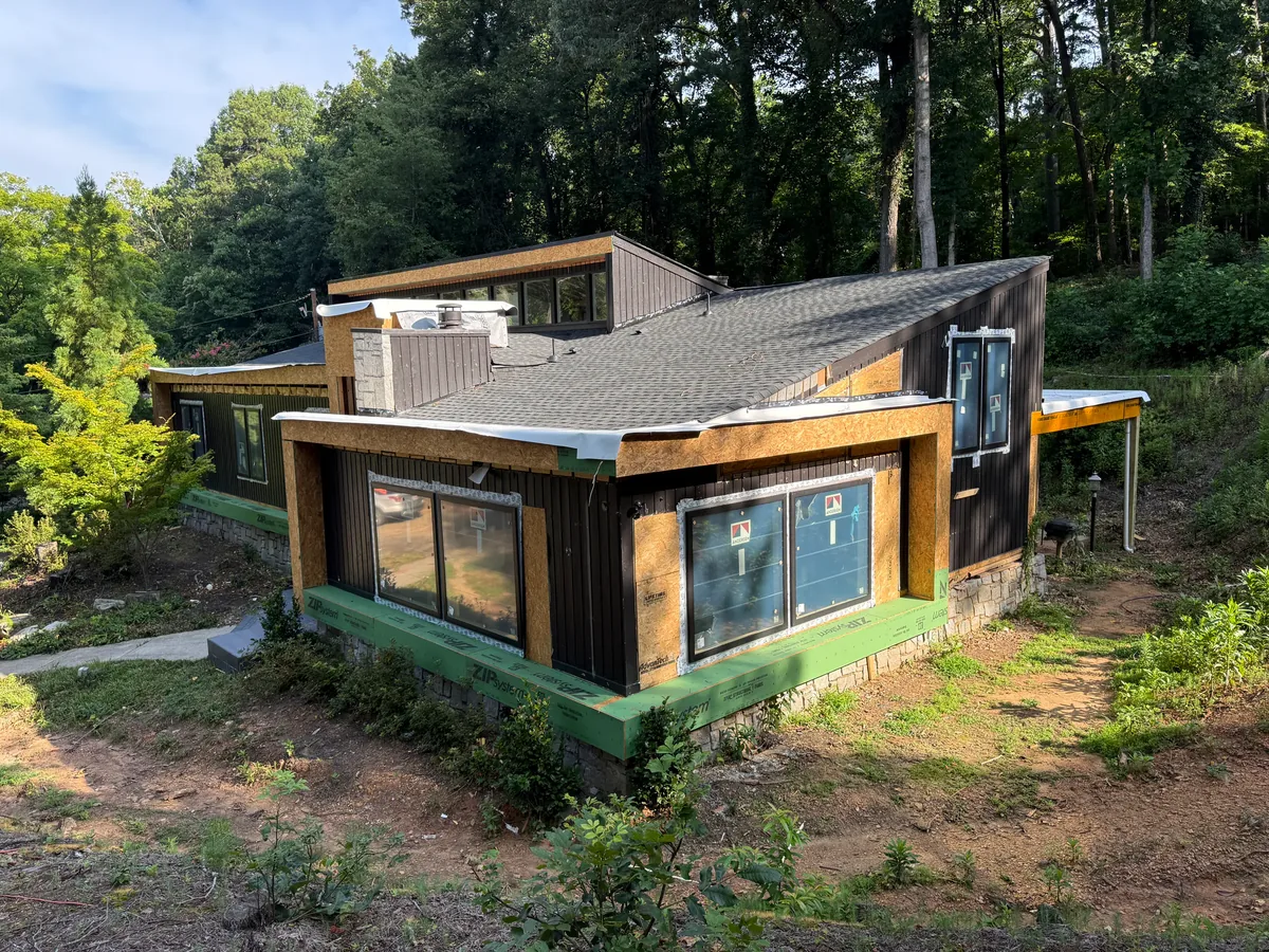 Photograph of the same asset during construction, exterior